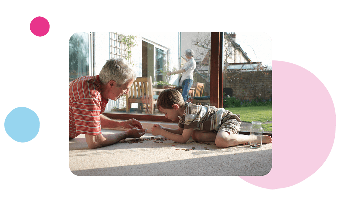 Adult and child playing with jigsaw